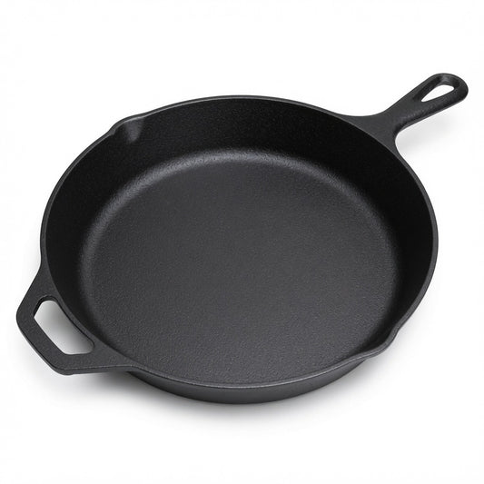 Black cast iron skillet on a white background